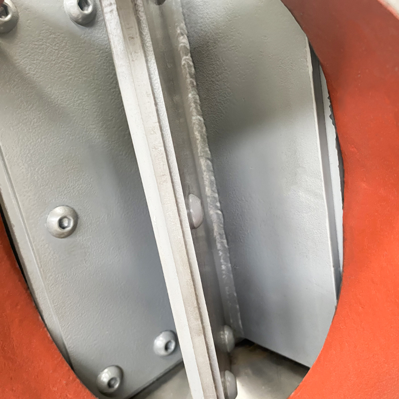 Valvola rotativa in materiale resistente all'usura